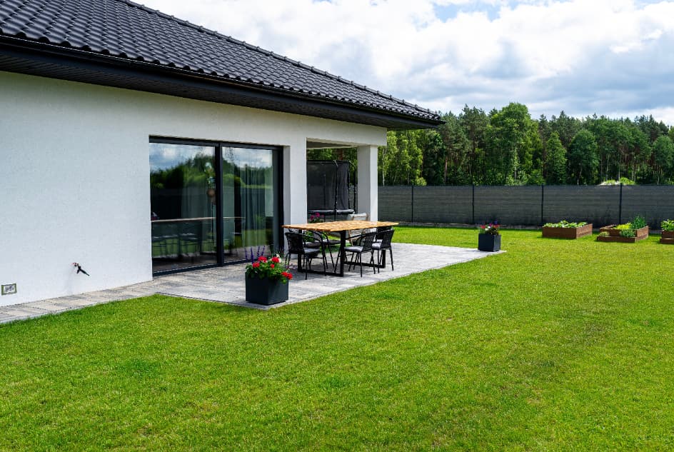 modern garden with grey composite fencing
