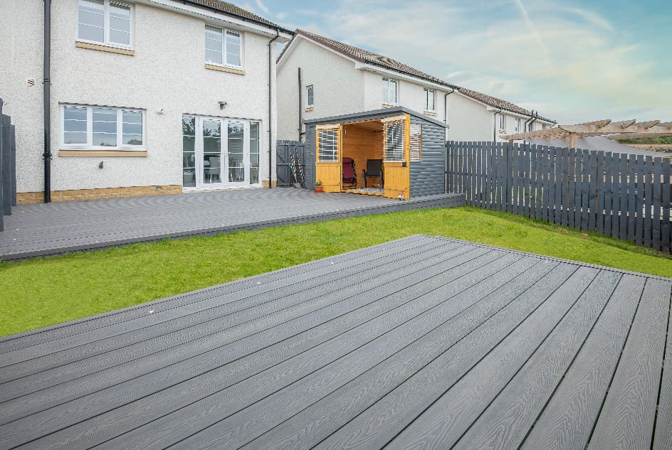 wide angle of a garden with grey composite decking